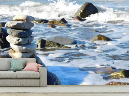 Fotobehang Stone pile at the sea